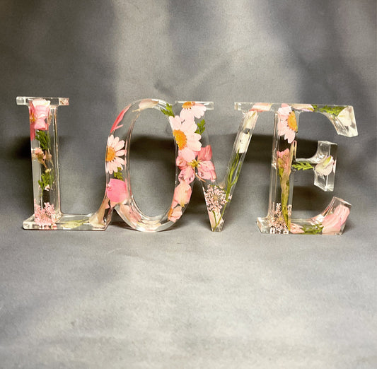 Floral pink love sign