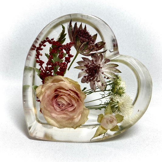 8cm freestanding heart containing a variety of tiny flowers