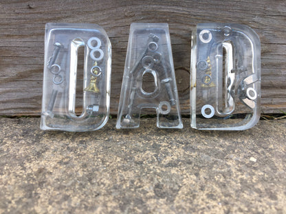 Freestanding nut and bolt Letters