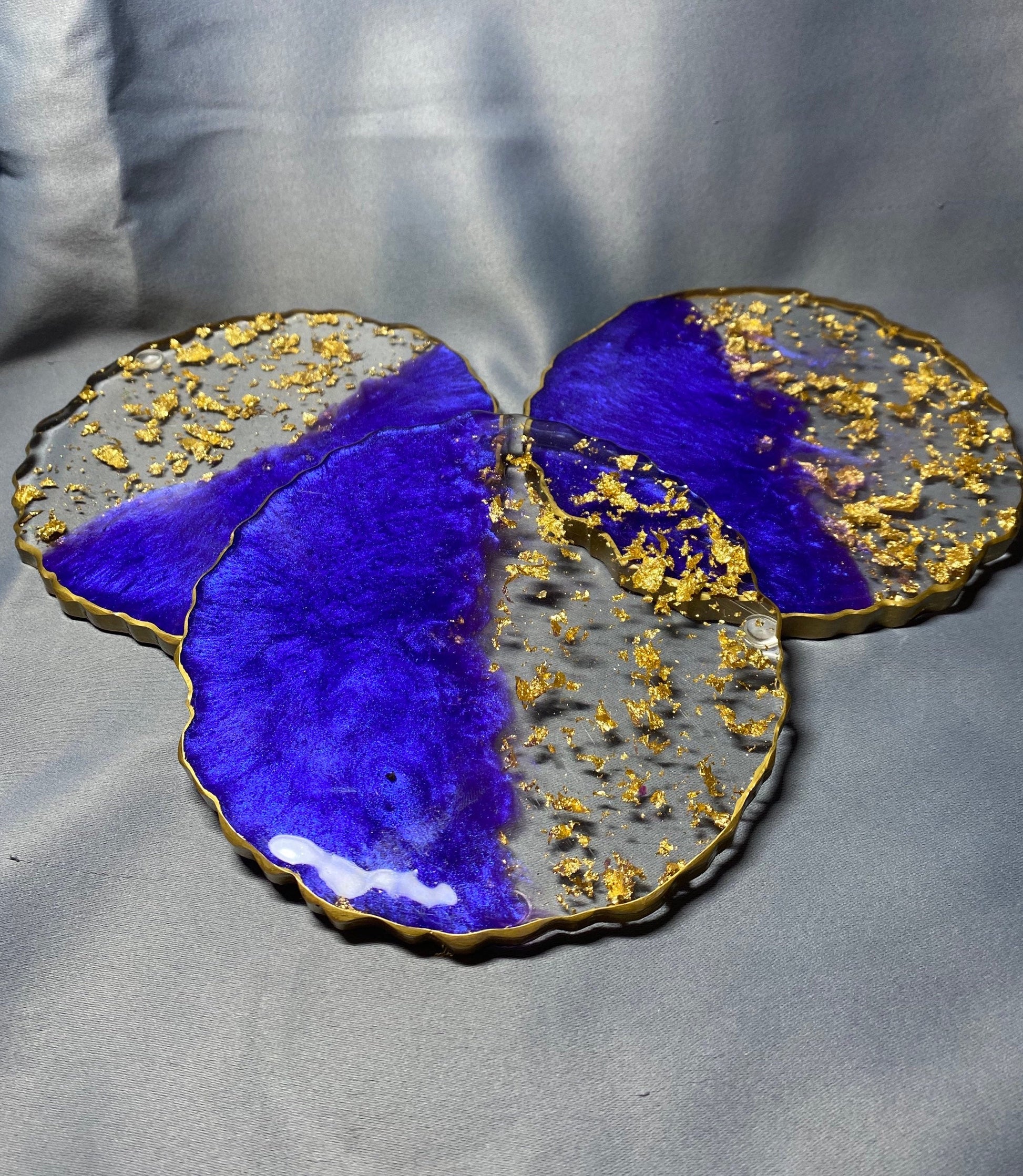 Violet and gold/silver coasters