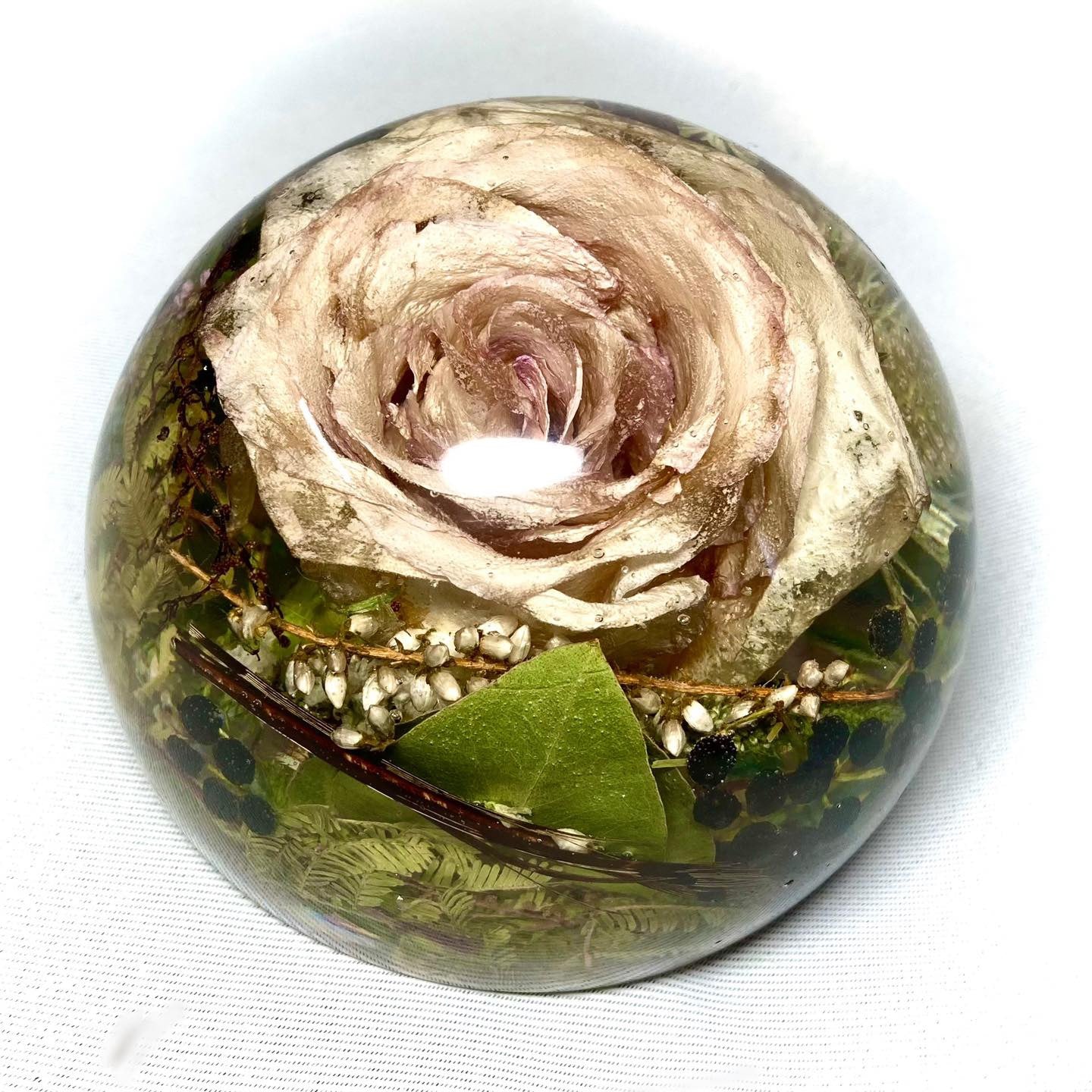 Preserve your memories of the special day with our beautiful Wedding Flowers Resin Sphere Paperweight. Handcrafted with love, our large resin spheres are perfect for showcasing your stunning wedding flowers in an elegant and unique way.