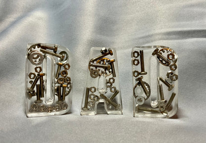 Freestanding nut and bolt Letters