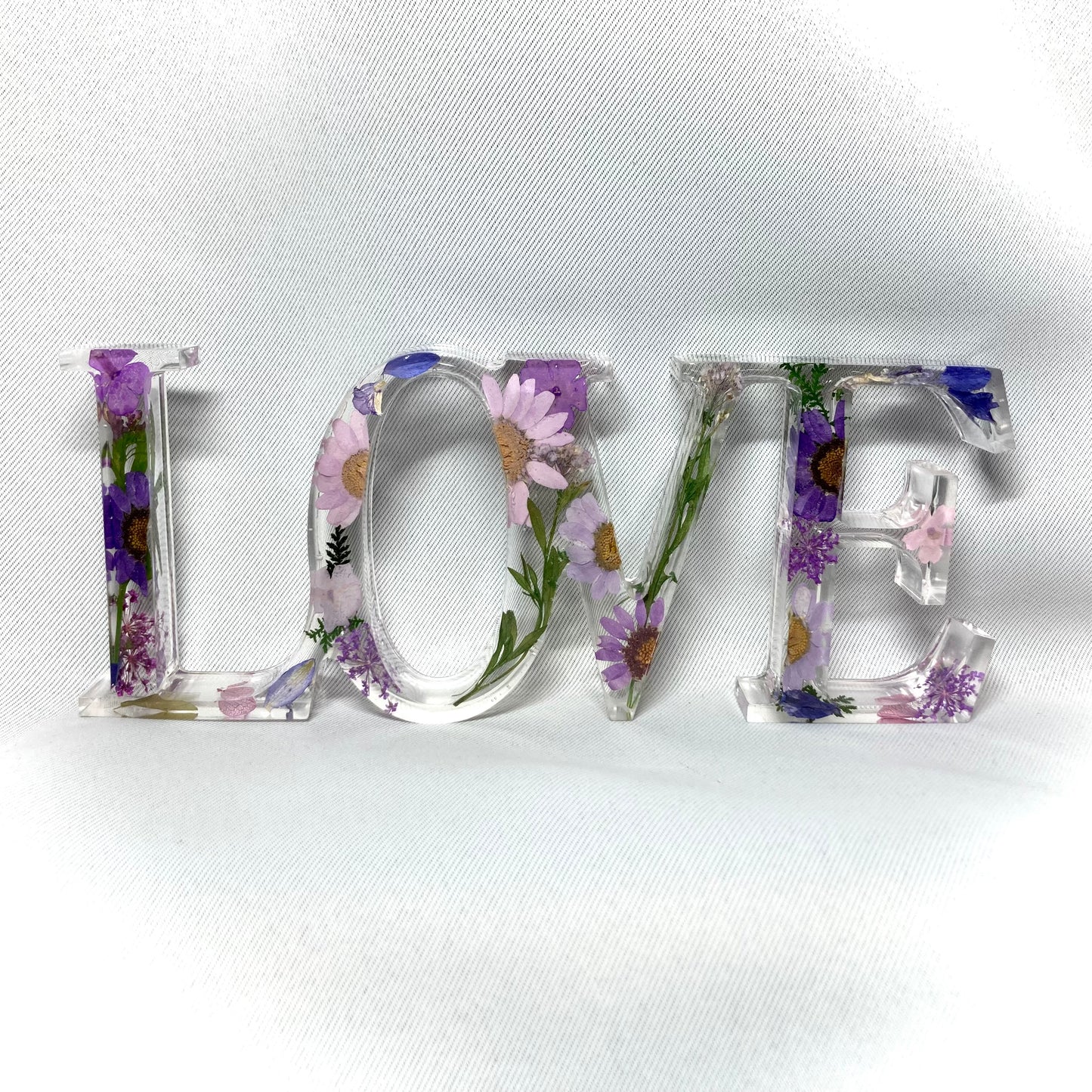 Floral purple love sign